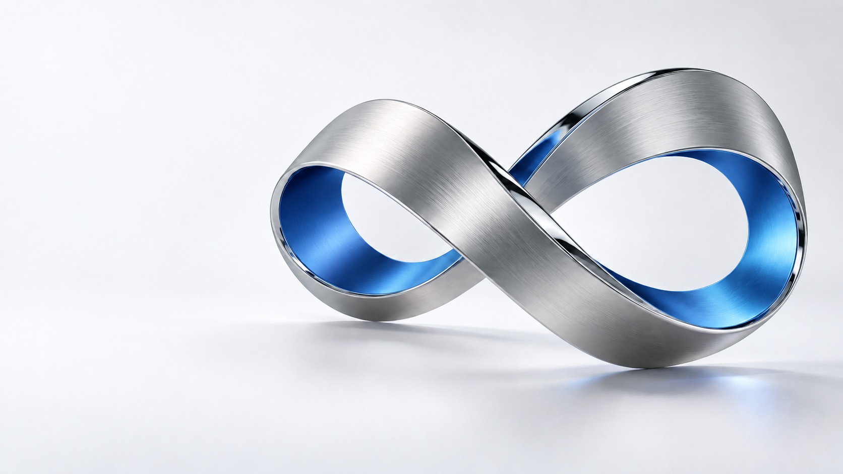 An endless silver ribbon with an blue inner surface, representing continuous learning.